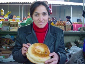 [Tajikistan] A woman selling bread in a Dushanbe market. | The New ...