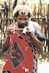 [Swaziland] Swazi elder indulging in marijuana imbibing
