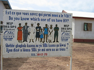 [Guinea] An AIDS awareness billboard in Laine refugee camp, Guinea. June 2004.
