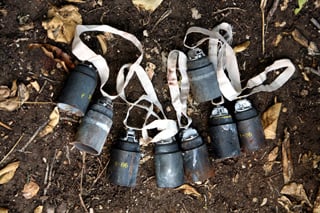 [Lebanon] Cluster bombs gathered to be destroyed by mine sweepers in the suburbs of Tyre city in southern Lebanon, 6 October 2006. Unexploded ordnance in southern Lebanon continues to pose great risks to civilians returning to their villages, according to