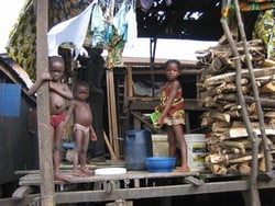 [Nigeria] Children in Makoko, a slum of houses on stilts in central Lagos, Nigeria. Some 15,00 people live here in the most basic conditions imaginable. [Date picture taken: 08/23/2006]