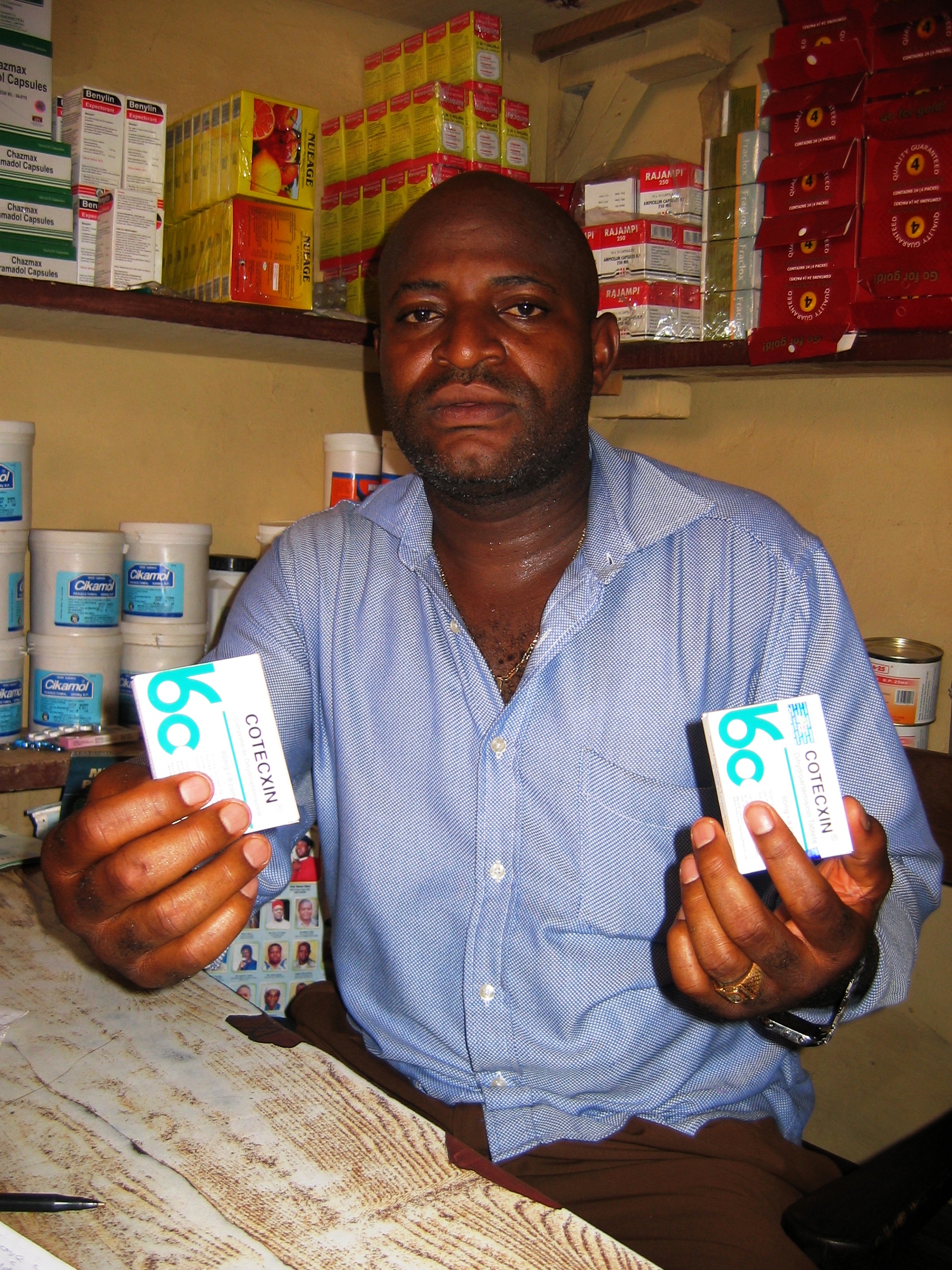 One of these packets of the anti-malaria medicine Cortecxin is fake, says Simon Okpoko, chairman of task force to stop fake drug at Ogbutu market, Enugu, Eastern Nigeria.