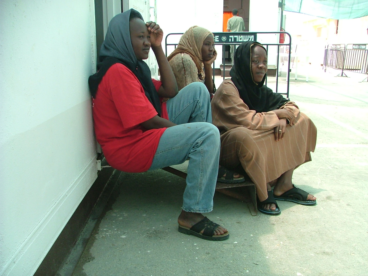 Three African female refugees inside a new camp set up by the Israeli authorities for illegal asylum seekers.