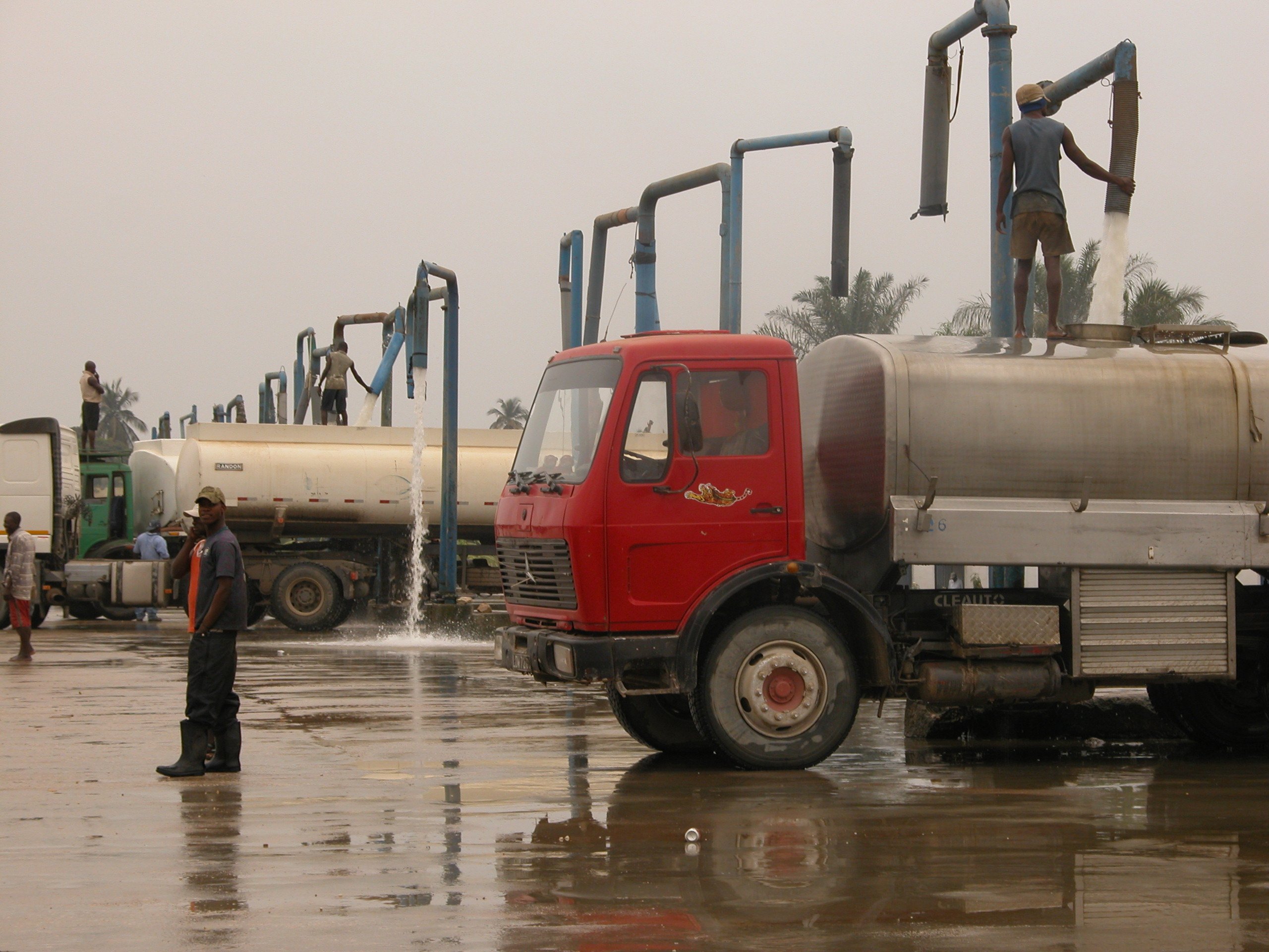 Tankers fill up at the private sector-run water pumping station in Kifangondo, outside the Angolan capital, Luanda.