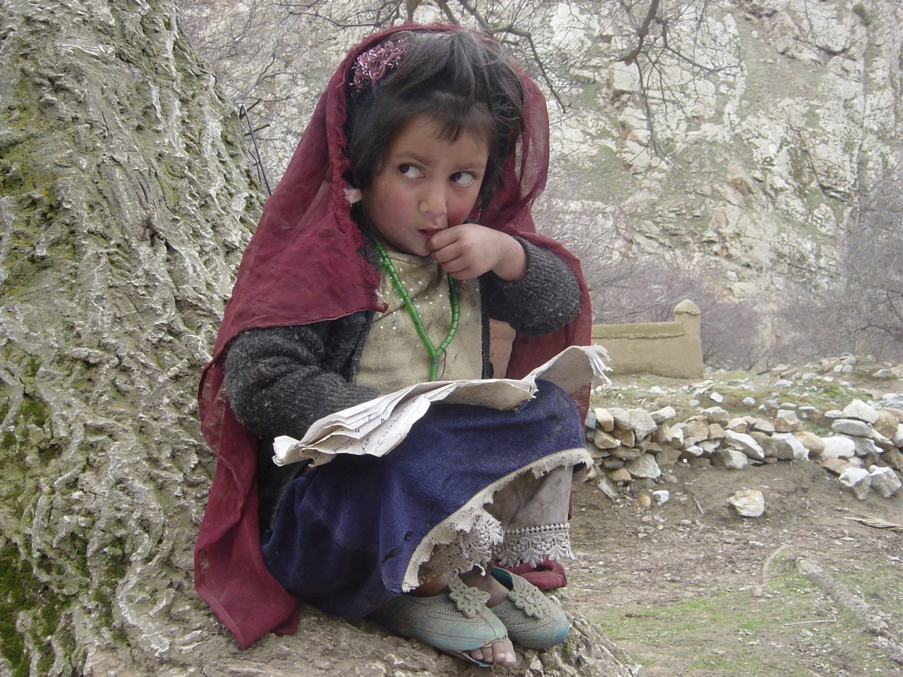 About two million Afghan children study in tents or in open air, according to Oxfam.