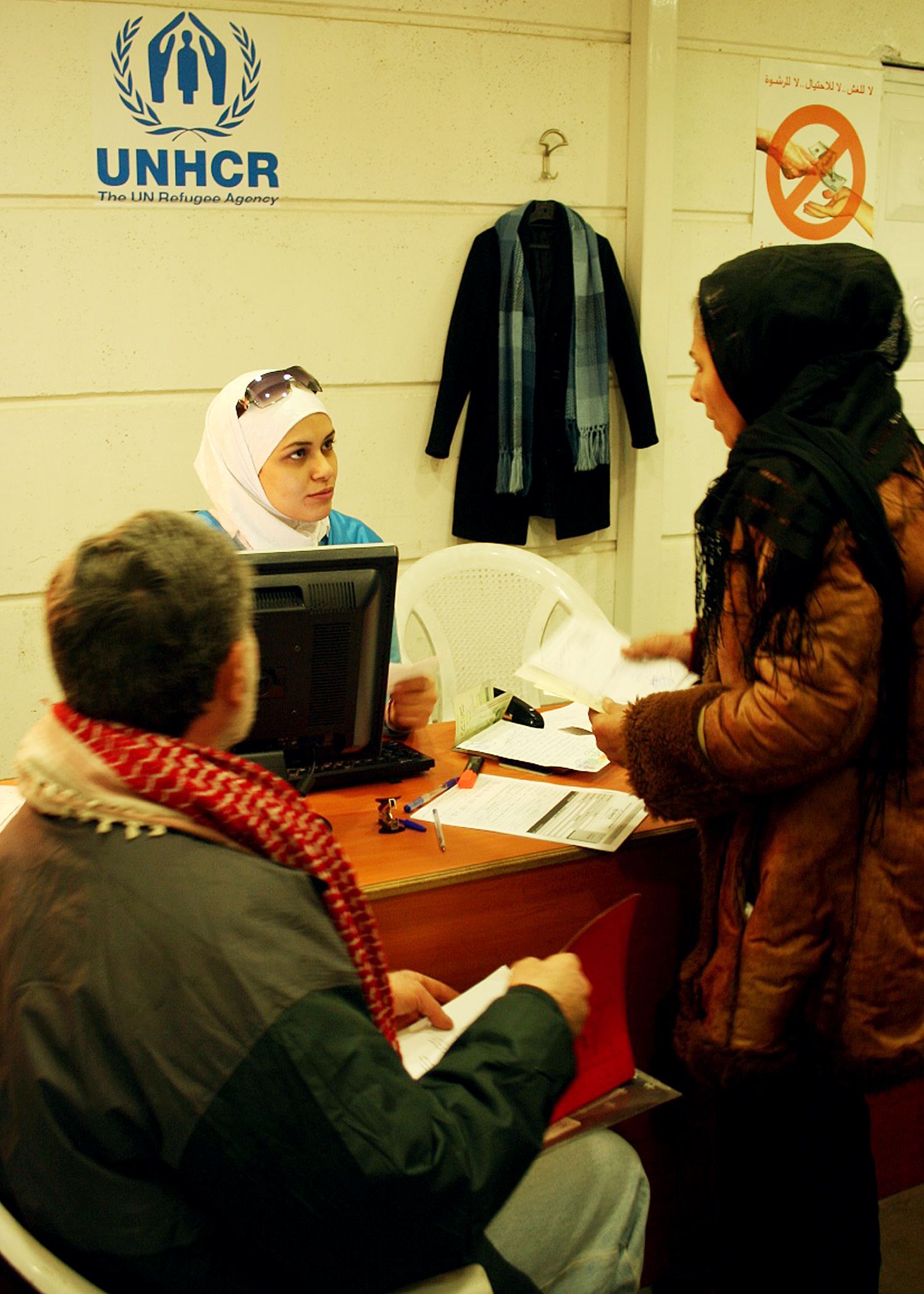 Iraqi refugees register at the UNHCR centre in Damascus. New figures reveal that refugees are suffering extremely high levels of trauma from the violence at home and their difficult circumstances in Syria.