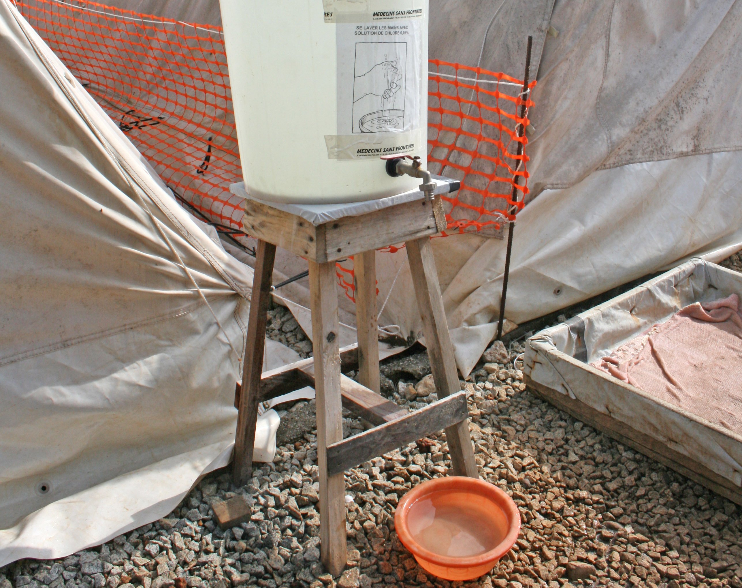 Post for sanitising hands, at a cholera treatment centre in the Guinean capital, Conakry. October 2007.