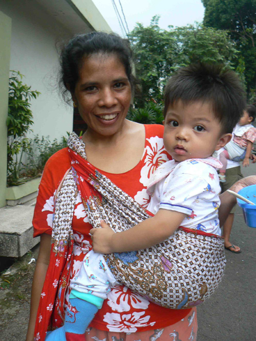 Eighteen-month-old William and his mother in Jakarta. On average only 14 percent of Indonesian babies are exclusively breast fed.