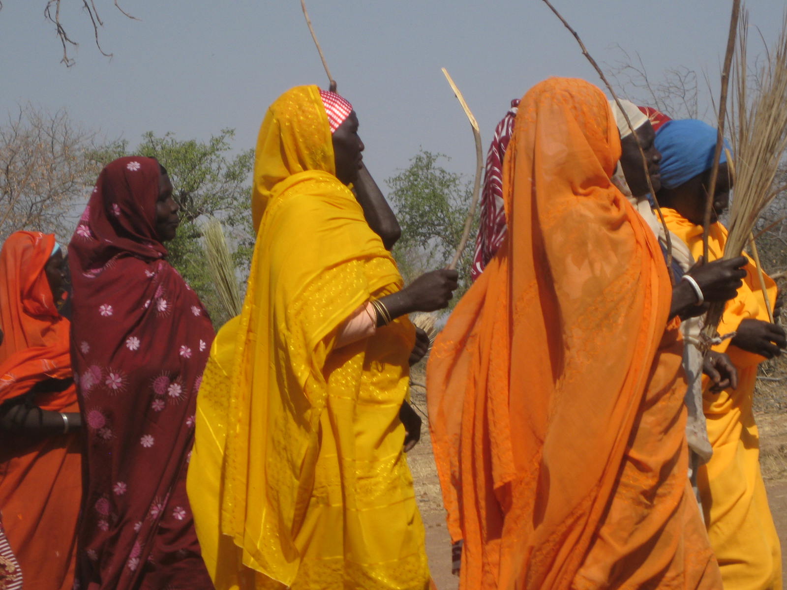 Local women dance in the village of Karkaraya Kayen located along the outskirts of the main town of Kadugli in Southern Kordofan state. The area is characterized by a lack of basic services as well as a poor road network