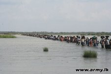 Civilians fleeing the no fire zones for government controlled areas on 20 April