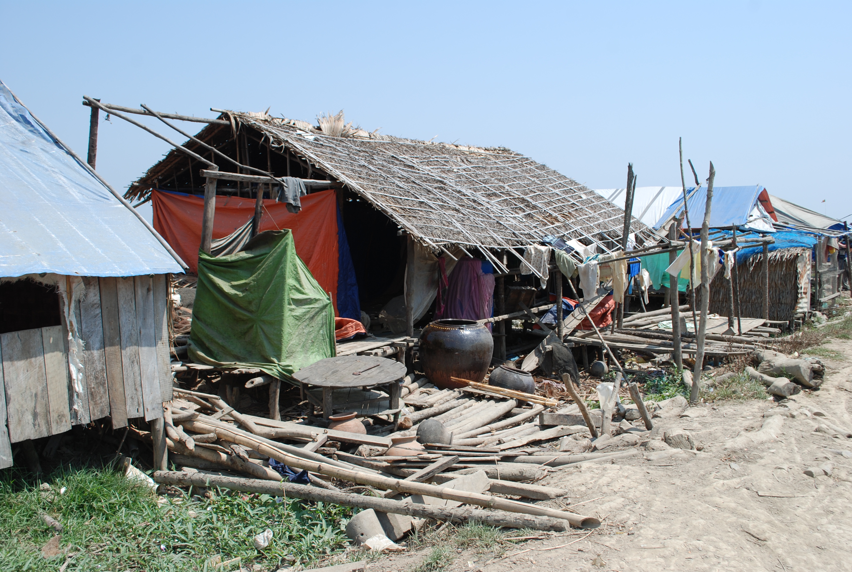 One year after Cyclone Nargis, more than 500,000 people - including 200,000 children - are still living in makeshift shelters which won't be able to withstand the monsoon rains, says Save the Children
