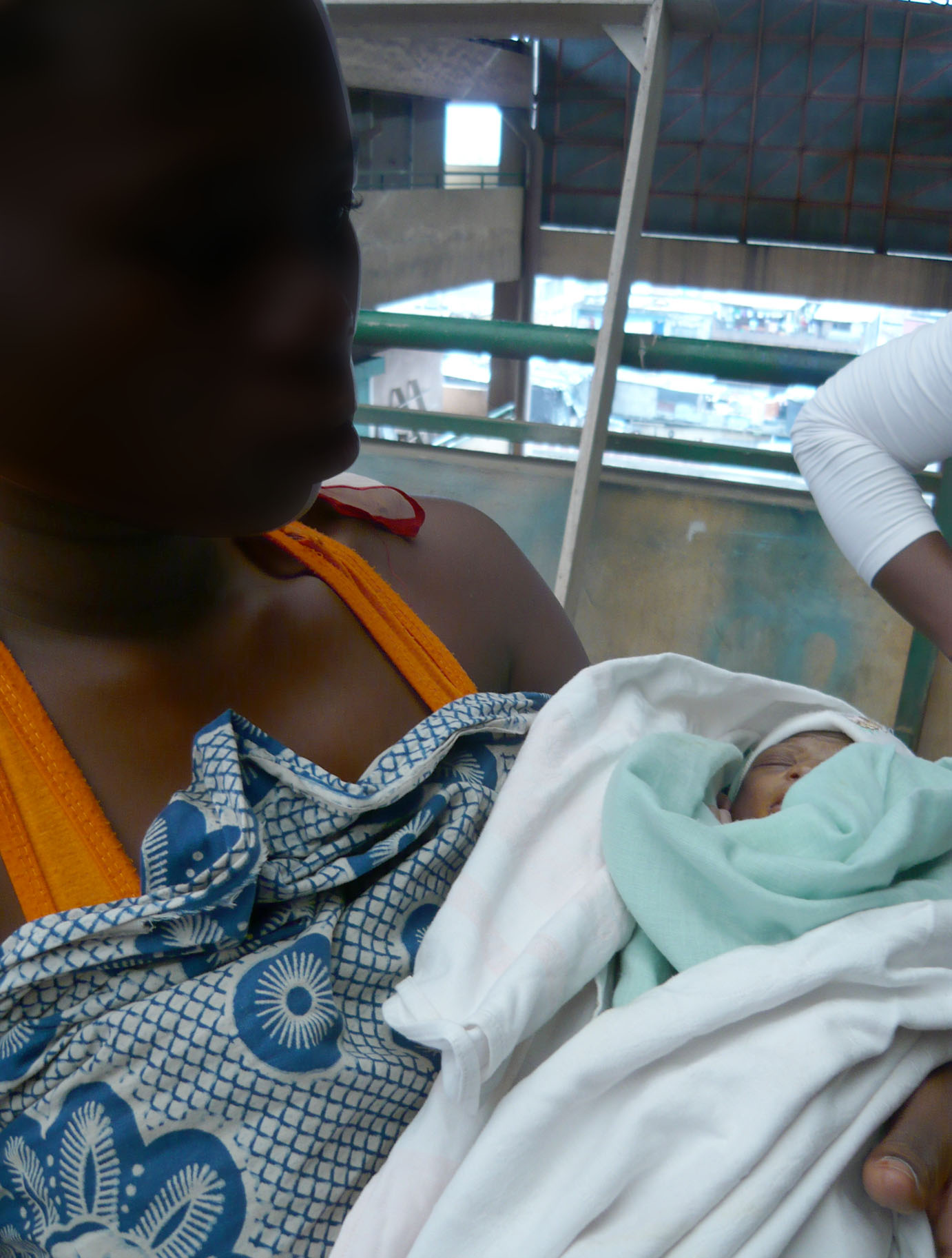 One of the young women who exchange sex for money in the Adjamé market in Côte d’Ivoire’s commercial capital Abidjan. She gave birth in the market; she said they both got wet when heavy rains leaked into the stall where they slept. The baby died on 