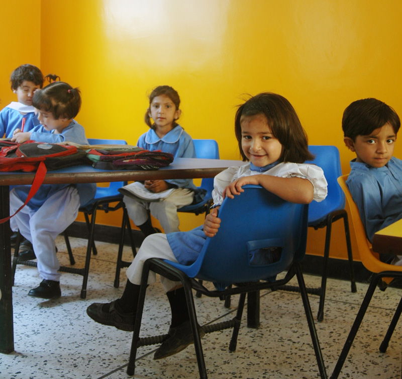 Inside one of the new schools in the quake-affected areas. Safer, brighter classrooms encourage learning