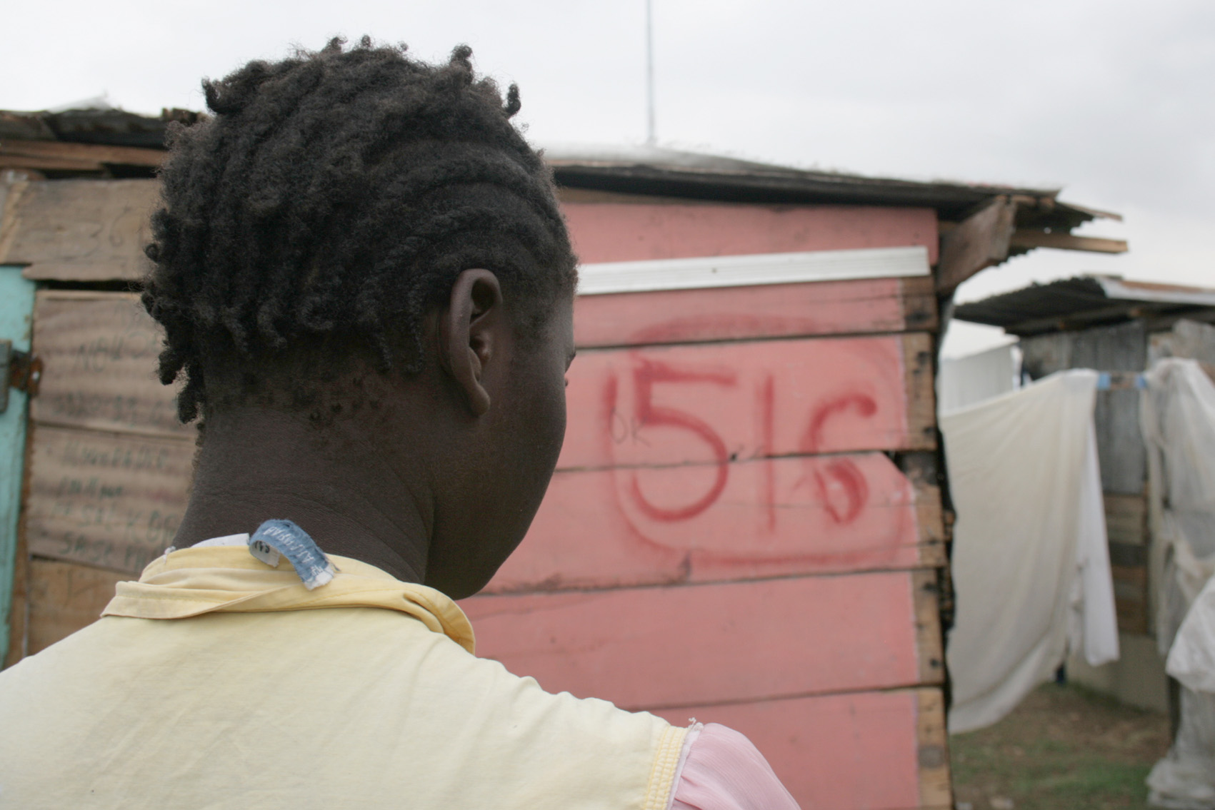 This woman was attacked by six men in a camp for displaced people in Haiti