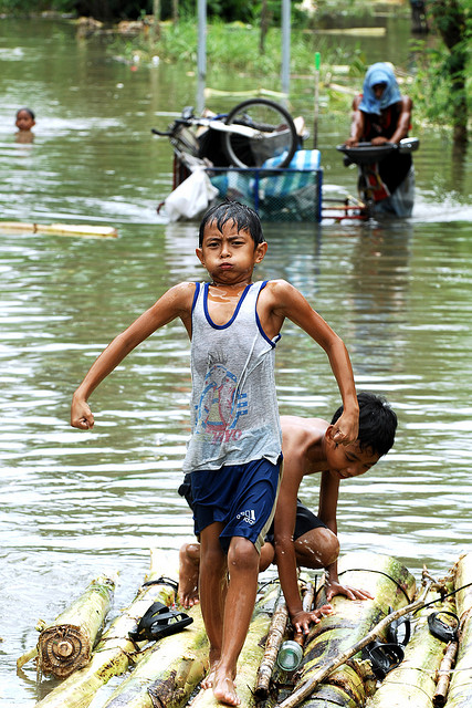 Residents of Los Baños and Bay towns, along the coast of Laguna de Bay and about 60 kilometers south of Manila, cope with floodwaters that have not receded 3 days after Typhoon Ondoy ravaged the Philippines