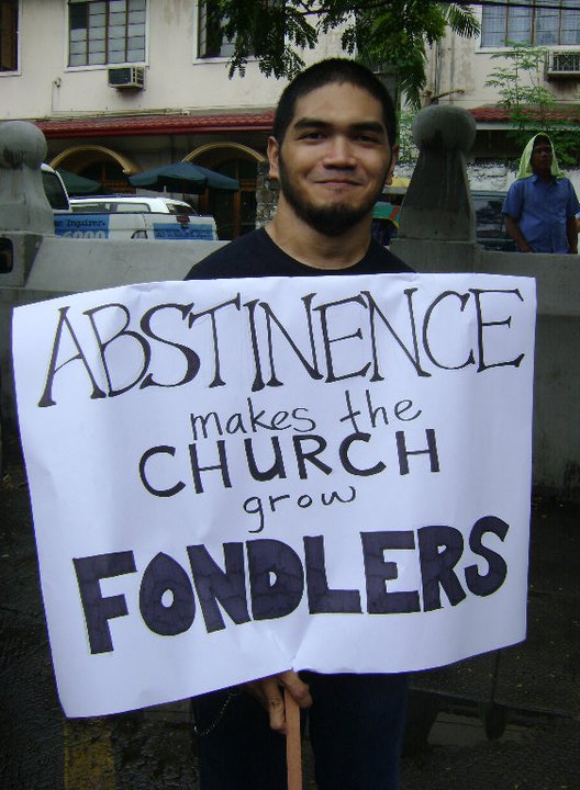 An RH supporter's placard openly states his opinion on the Church's abstinence policy