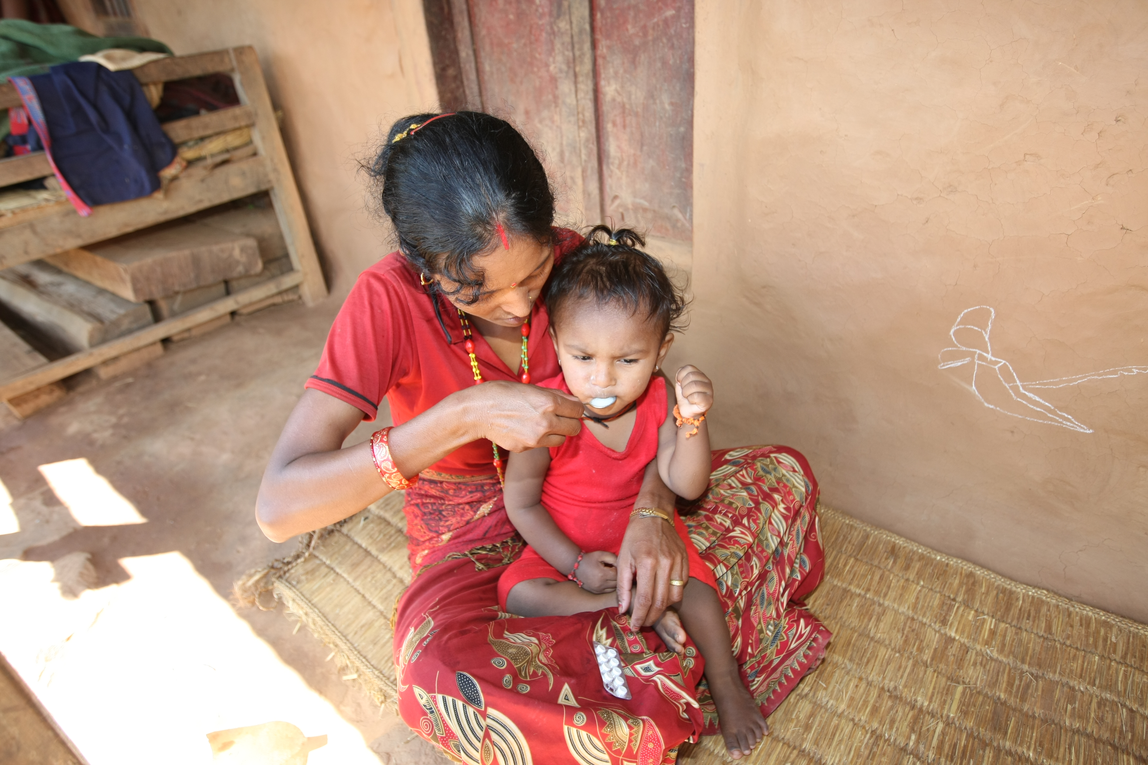 A woman providing food with zinc in Gorkha District Zinc usage in Nepal is slowly catching on