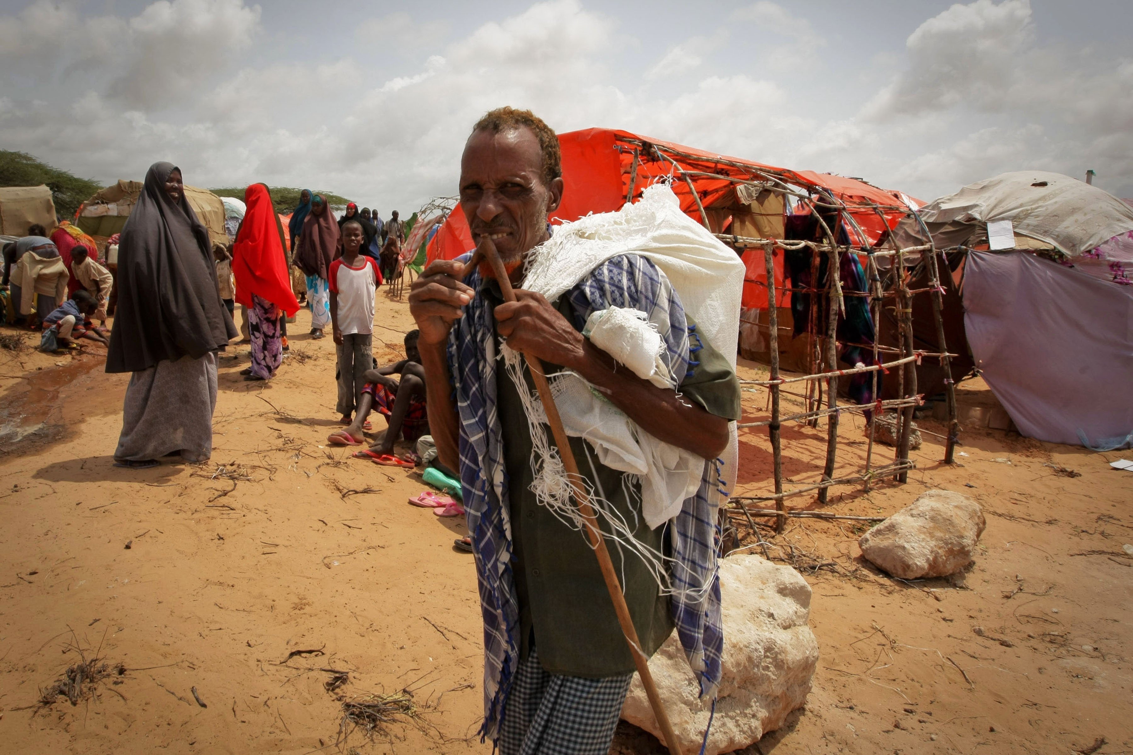 A man arrives at the Badbado camp for Internally Displaced Persons (IDPs). Famine has been declared in two regions of southern Somalia – southern Bakool and Lower Shabelle