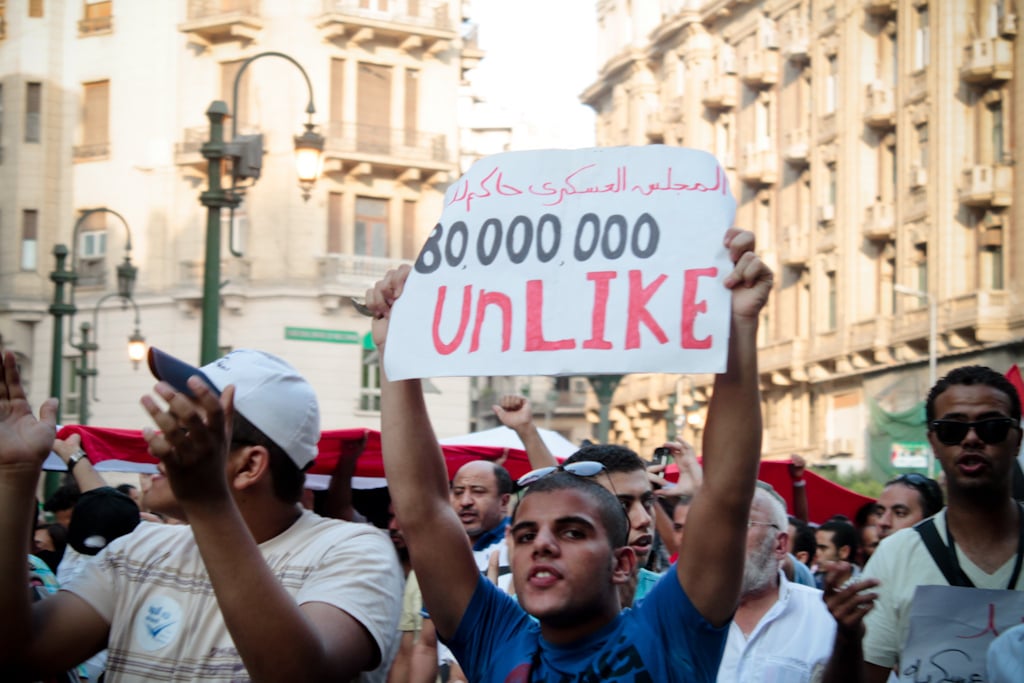 Egyptians protesting against the ruling Supreme Council of the Armed Forces and the military trials of civilian activists