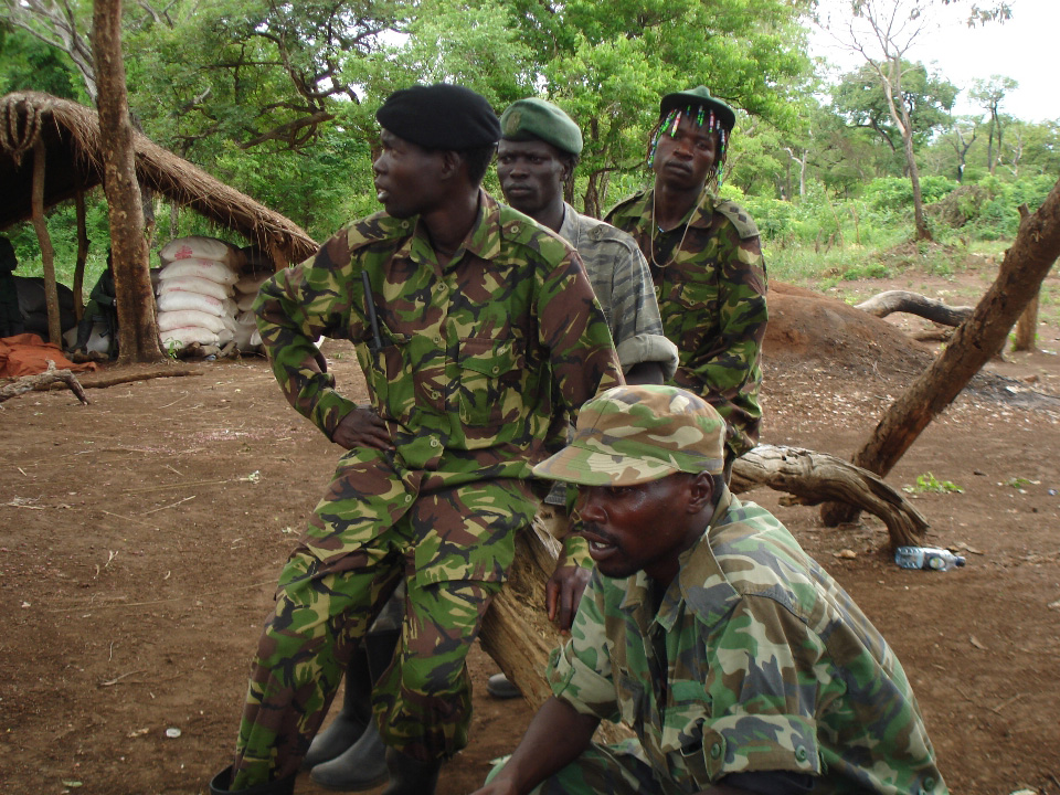 Some of the LRA soldiers sit outside, Sudan, April 2007