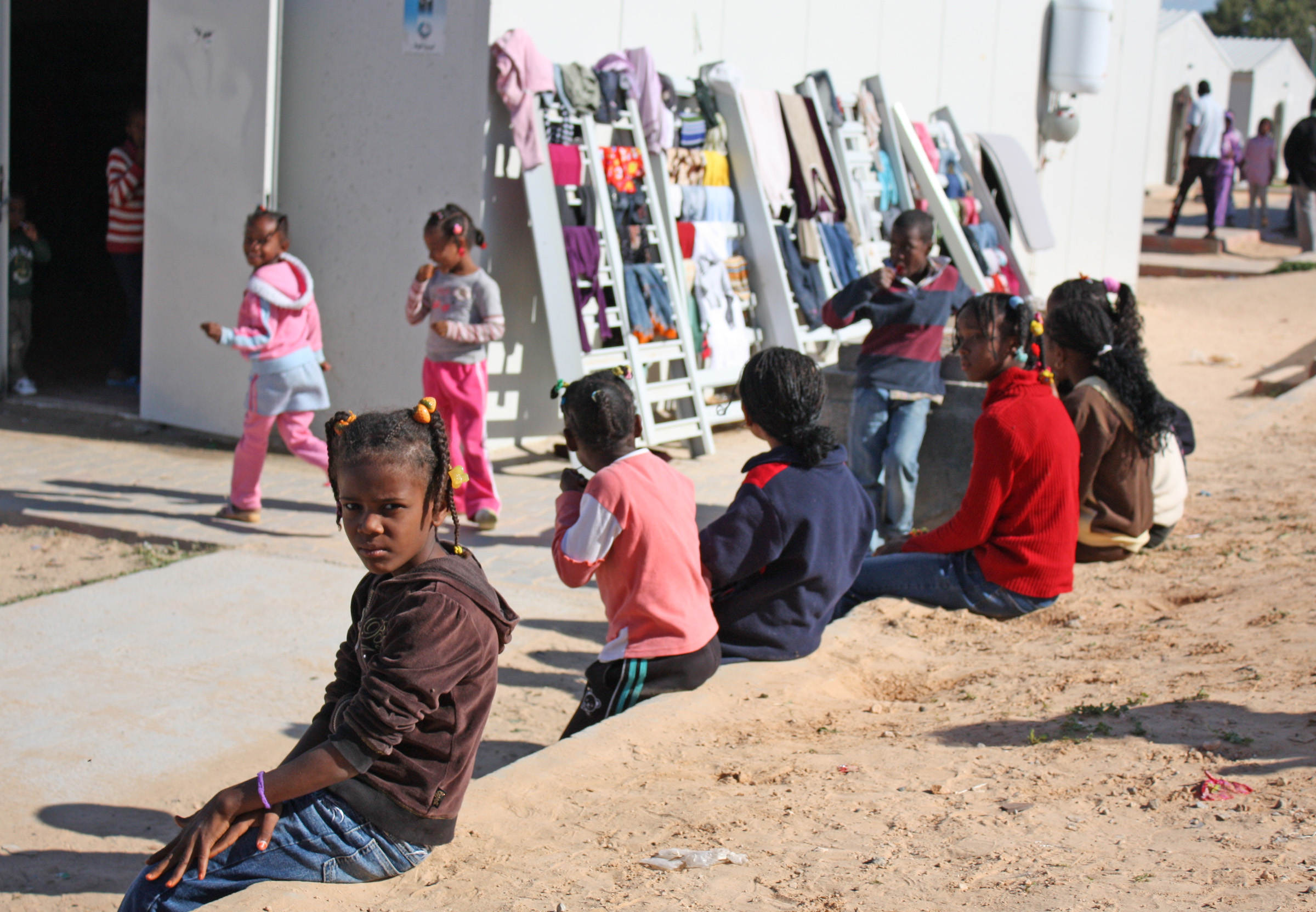 Children at the site for people displaced from the town of Tawergha during the 2011 Libyan civil war. "Airport Road / Turkish compound" site in Tripoli, November, 2011.