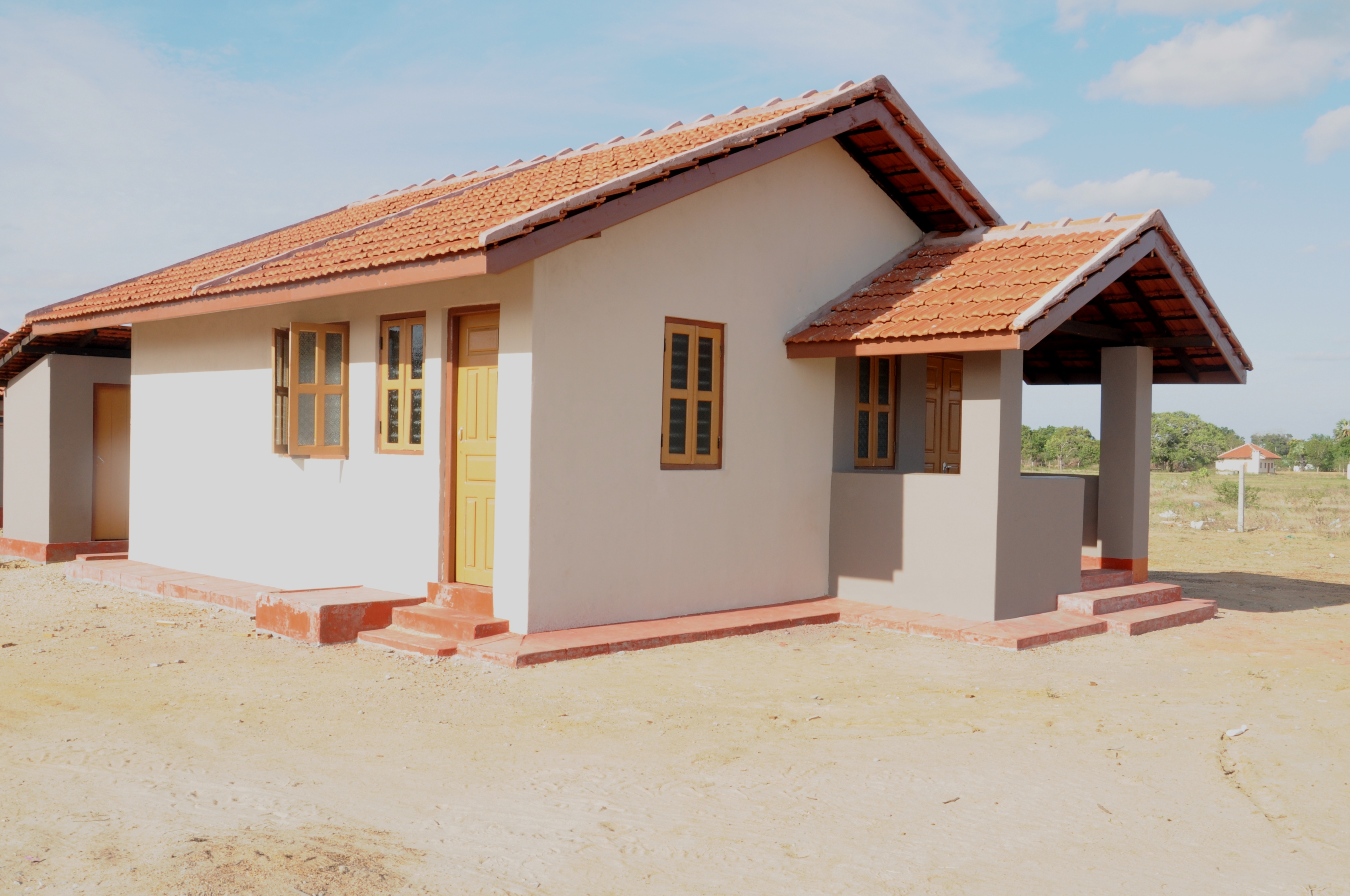 Indian boost for IDP housing New Indian government subdidized housing in Ariviyal Nagar, Kilinochchi District