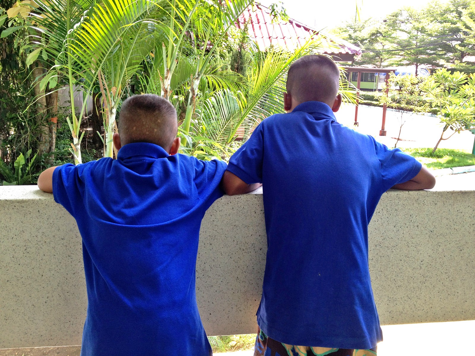 Eight-year-old Siyathon, left, and Ongsi, 10, were trafficked from their home near the Burmese border to sell flowers in Bangkok. They stayed temporarily at a boys' shelter in Pak Kred, Nonthaburi province, before returning home