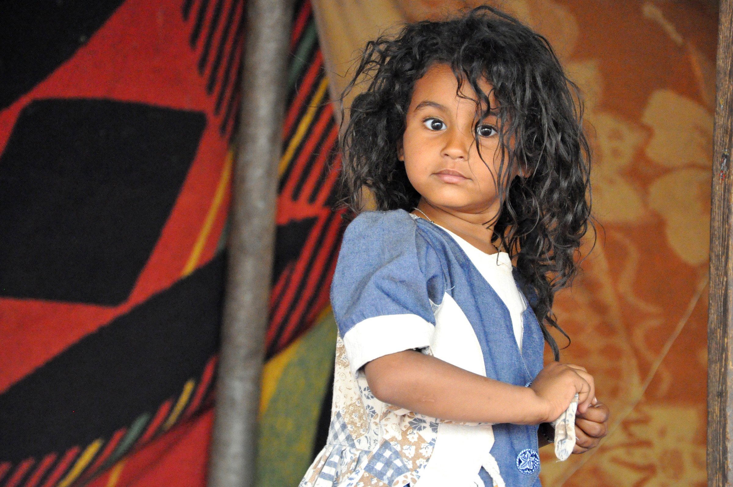 A young girl at the Tayuri settlement in Sebha, home to many Tuareg and Tubu communities, Libya