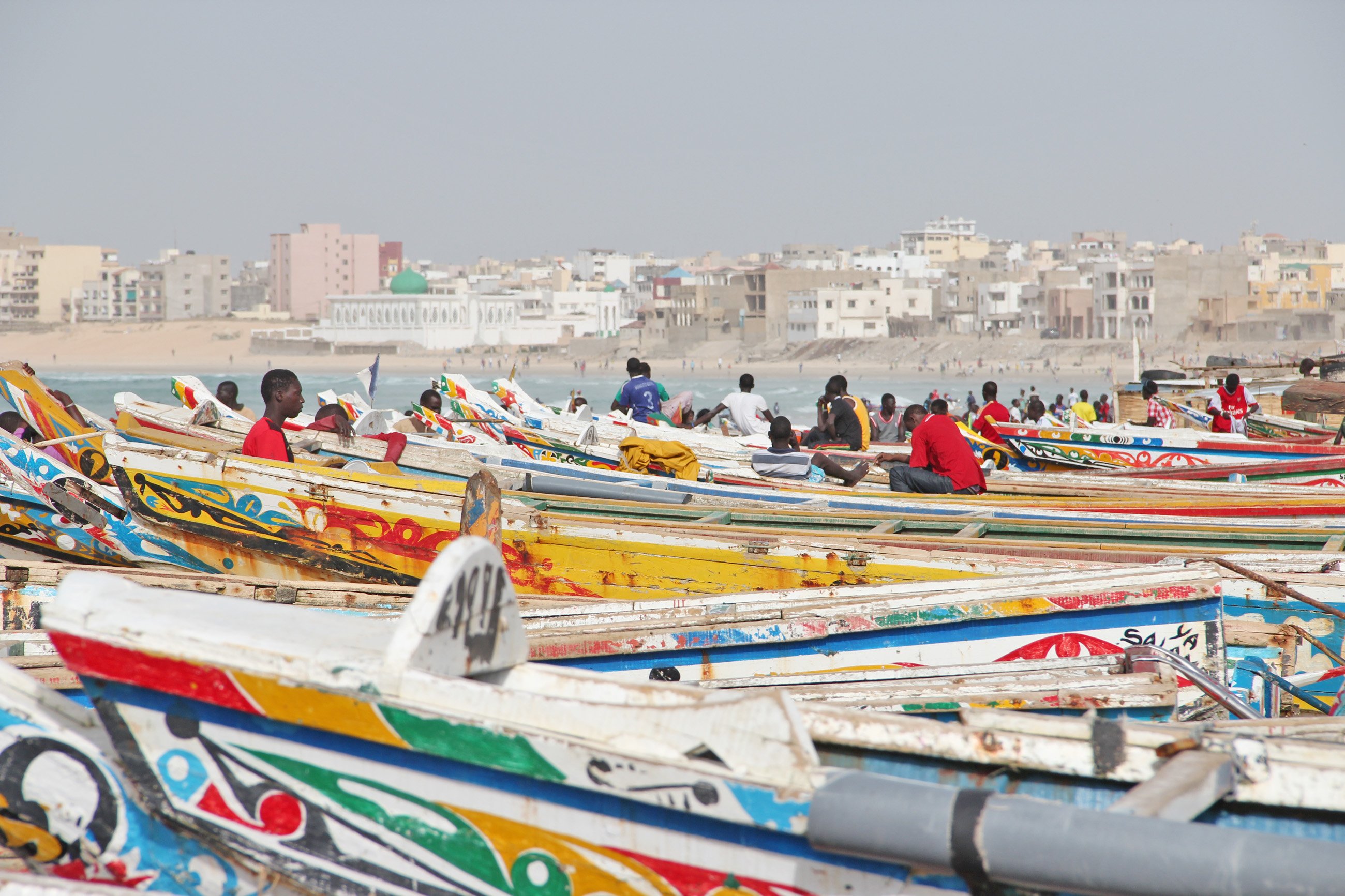 Artisanal boats moored on a beach in Dakar, Senegal. The UN Food and Agriculture Organisation estimates that there were around 16,000 small fishing boats in Senegal in2011, from just about 5,000 in 1982. Local fishermen have also been blamed for overfishi