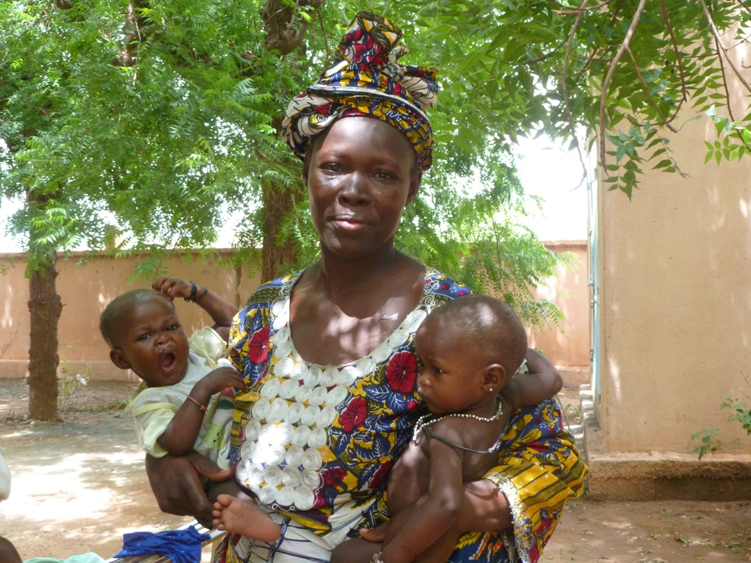 A mother and her malnourished children at Mopti reference hospital in central Mali, July 2012. Malnutrition rates - both chronic and acute - are always unacceptably high in Mali, whether harvests are good or bad