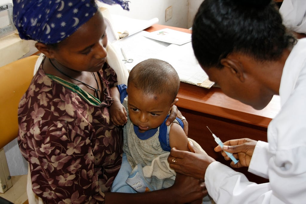 Child receives her measles vaccination, in Ethiopia's Merawi province