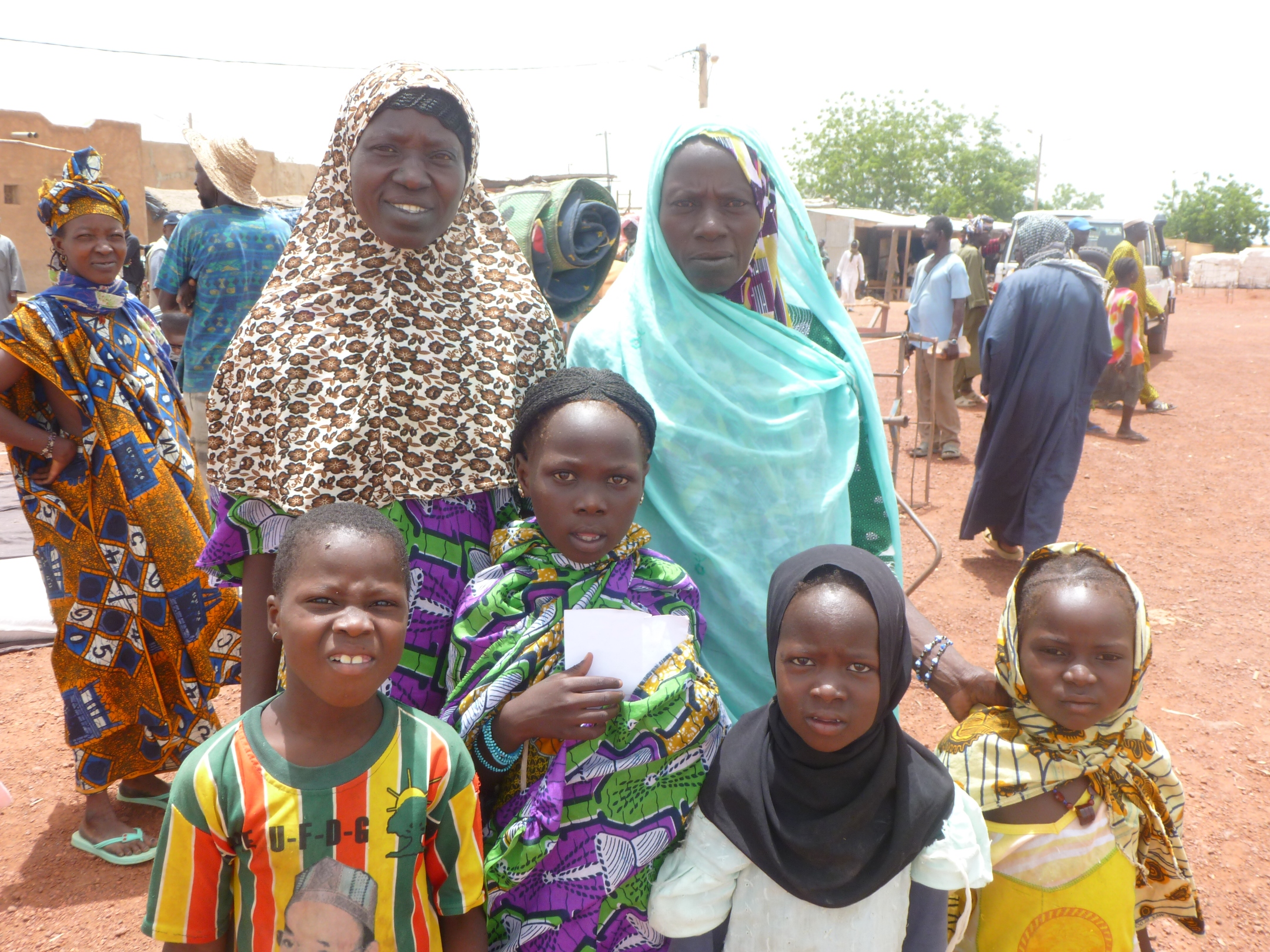 These women and children have fled Timbuktu to temporarily settle in the outskirts of Mopti following the takeover of their town by fundamentalist Islamists. Fish-sellers by trade, they said Islamic groups forbade them from selling fish on the streets, so