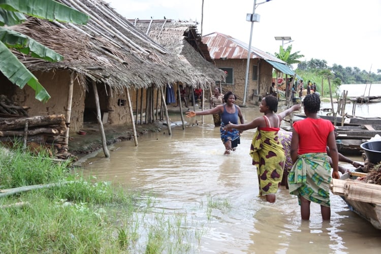 Women lamenting their plight as a result of rising water levels in Toru-Orua in Sagbama local government area of Bayelsa state. September 2012. The National Emergency Management Agency, NEMA, estimates 1.3 million Nigerians were displaced by floods this y