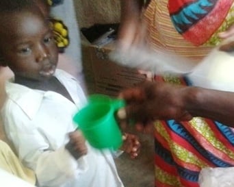 A child receives one of three monthly doses of Fansidar, a combination anti-malarial therapy that has been rolled out July to October 2012 to prevent malaria on a mass scale in Koutiala Mali as a pilot project by MSF