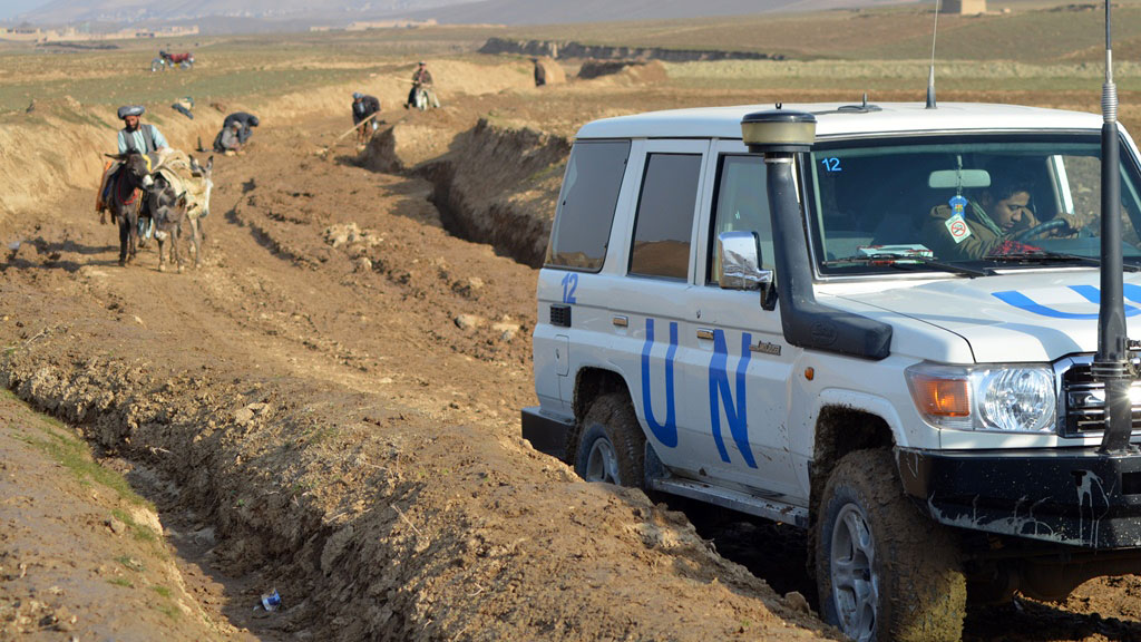 An OCHA delegation visits a cash-for-work project to build a road in Pashtun Kot District in Afghanistan’s northern Faryab Province to help people affected by drought (Jan 2012)