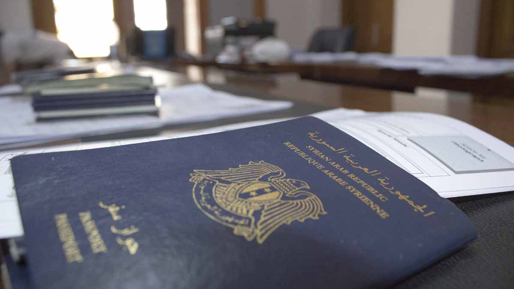 Syrian passport on desk during the UNHCR registration mission in Misrata