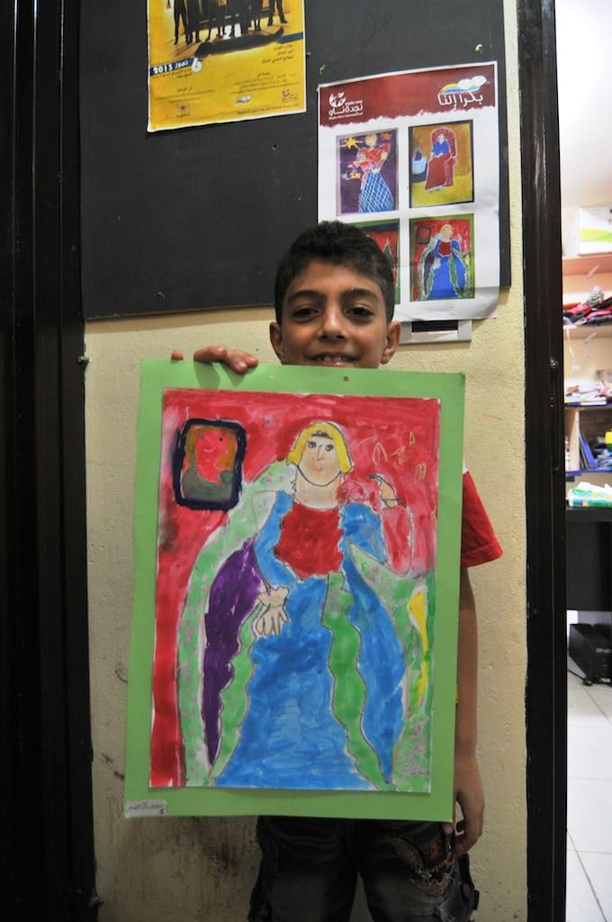 Faysal, 11, left Rural Damascus in Syria after his uncle was shot dead by a sniper. He is now a refugee in Lebanon, where the NGO Najda Now has encouraged him to express himself through art. His drawing of a princess was sold at an exhibition (see flyer i