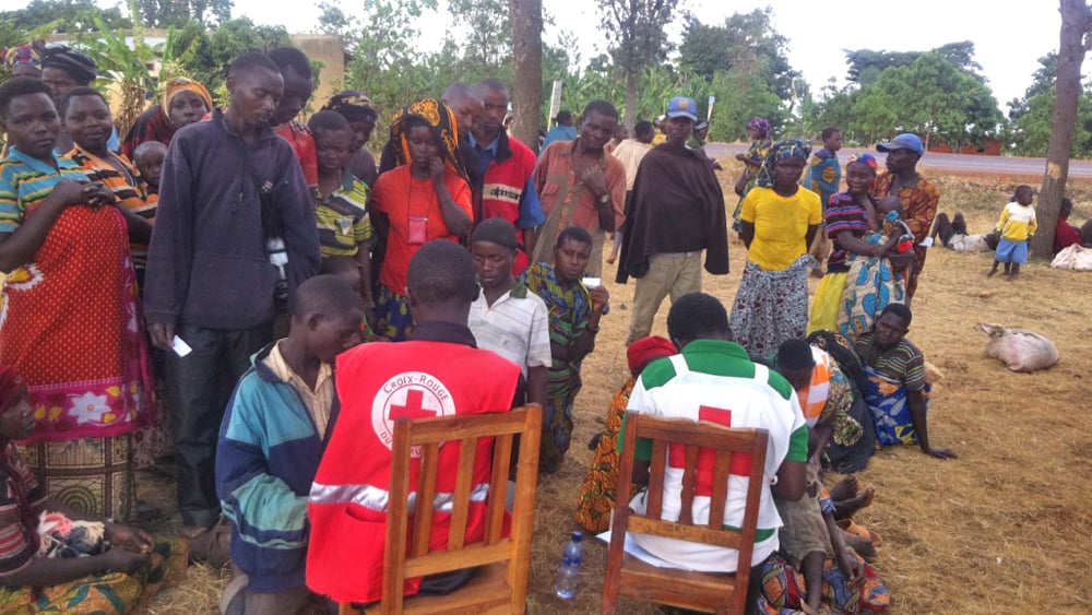 Returnees get registered by the Red cross at Rugari on September 13, 2013