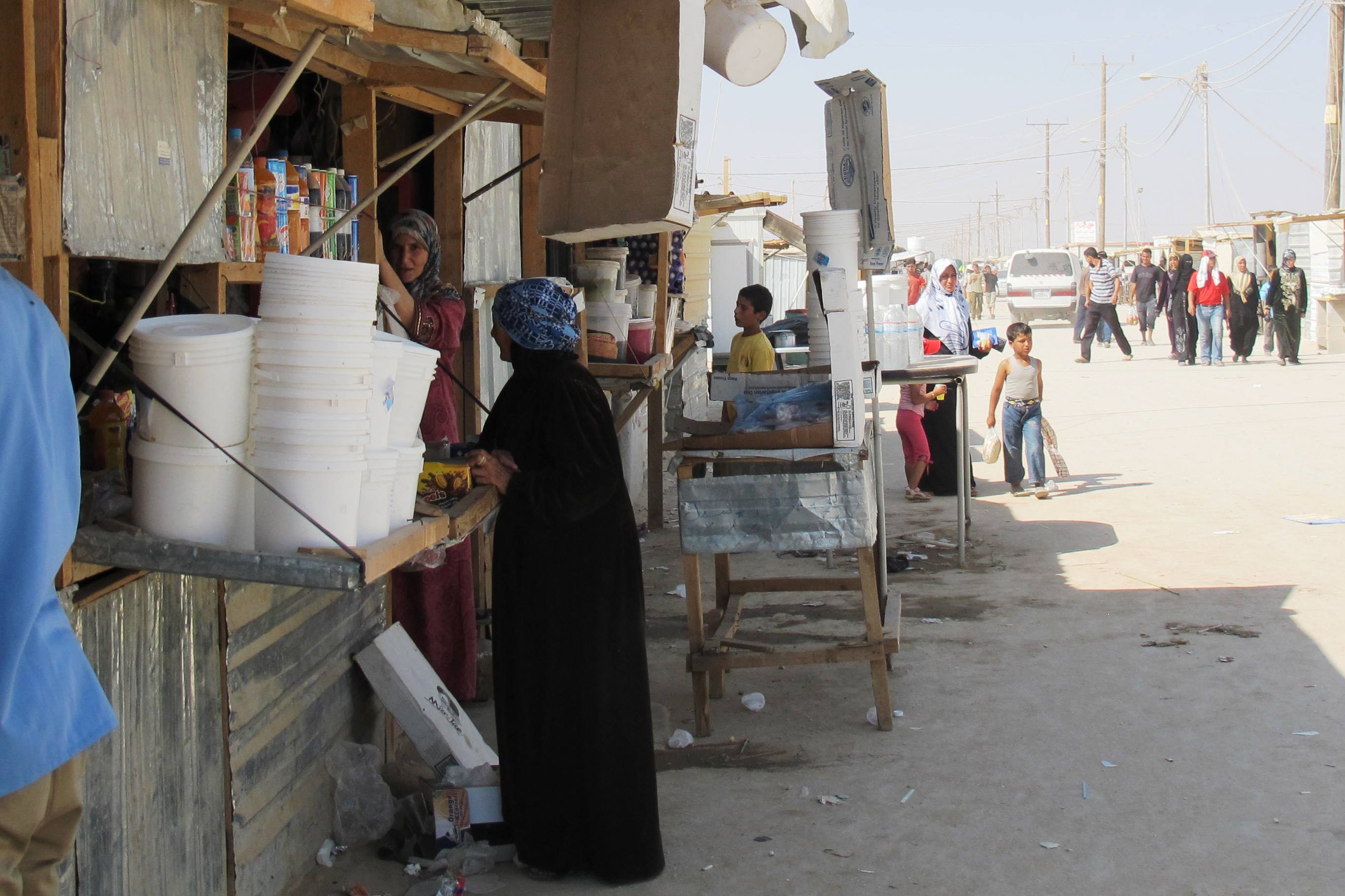 The market on the main street in Za'atari camp for Syrian refugees in Jordan. The camp is now Jordan's fourth largest city. Residents have nicknamed the main street the Champs-Élysées of Za’atari