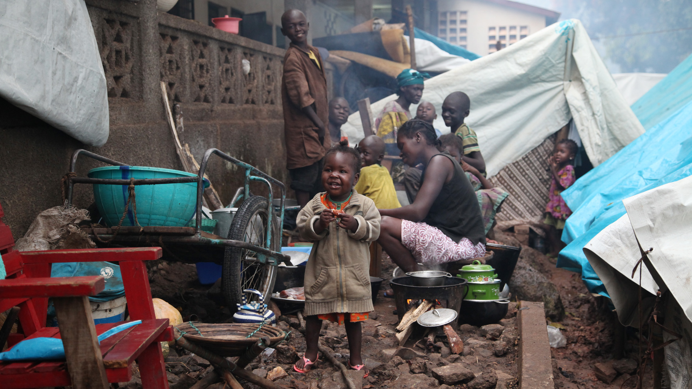 Religious violence and the seeds of hate in CAR A mother and child at Bossangoa's packed church grounds, where
36,000 people are squeezed into 19 hectares of land
