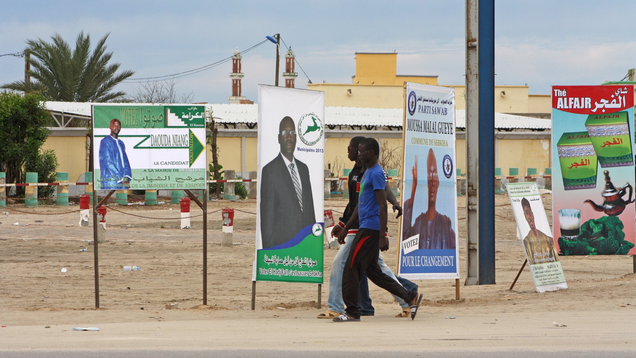 Campaign posters for candidates running in 23rd November local and general elections, in Nouakchott's Sebkha neighbourhood.