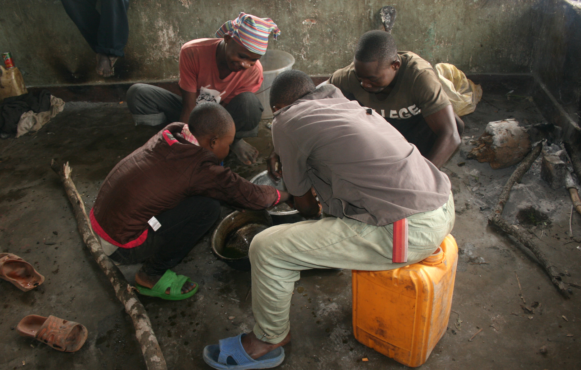 Demobilized Kata Katanga fighters at a dilapidated holding centre in the DRC town of Manono.