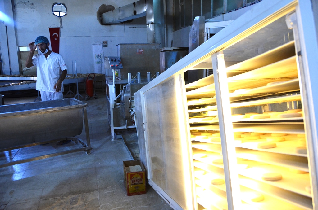 The Turkish NGO IHH bakes bread in a warehouse in the border town of Reyhanli in southern Turkey to distribute to Syrian refugees and Syrians in need on the other side of the border. 