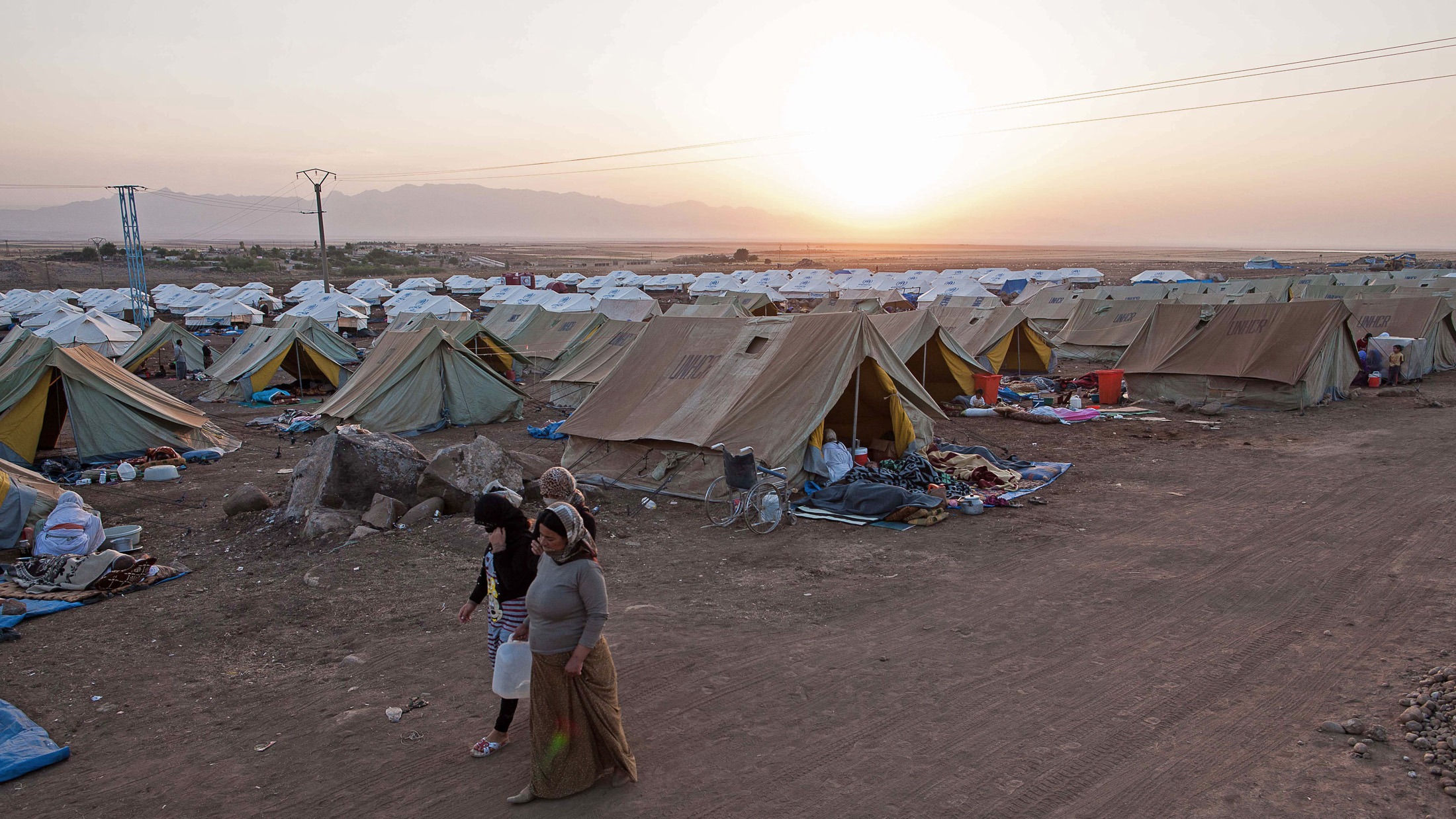 Newroz camp. Situated next to the town of al-Malikyah in Rojava, Syria, Newroz was initially established to shelter Syrians displaced from the ongoing Syrian civil war.