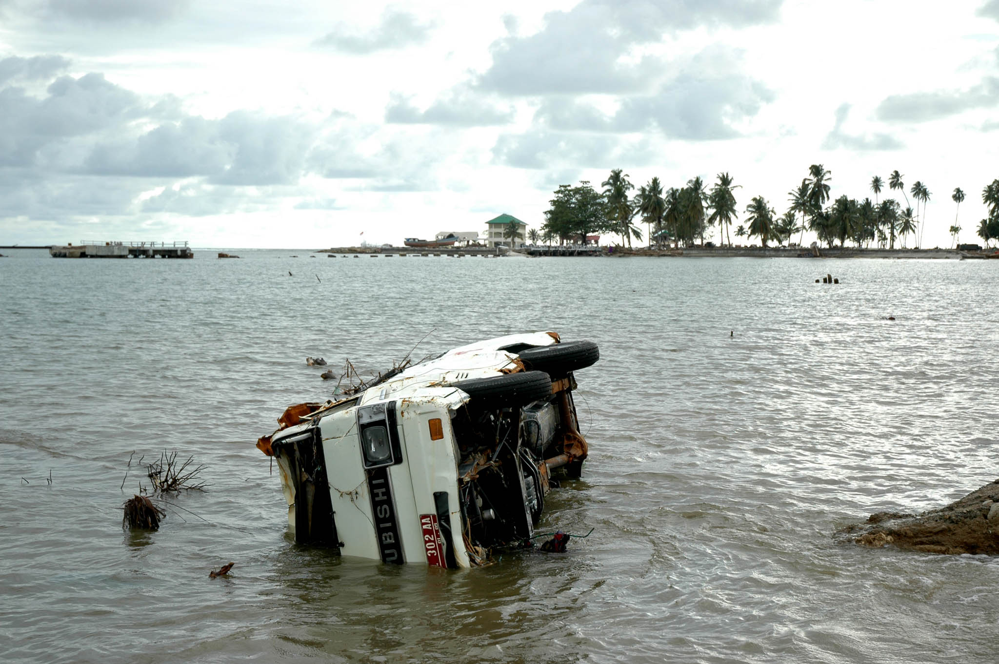 A rescue vehicle itself in need of rescue after the tsunami hit Meulaboh, West Aceh (File photo 2004)