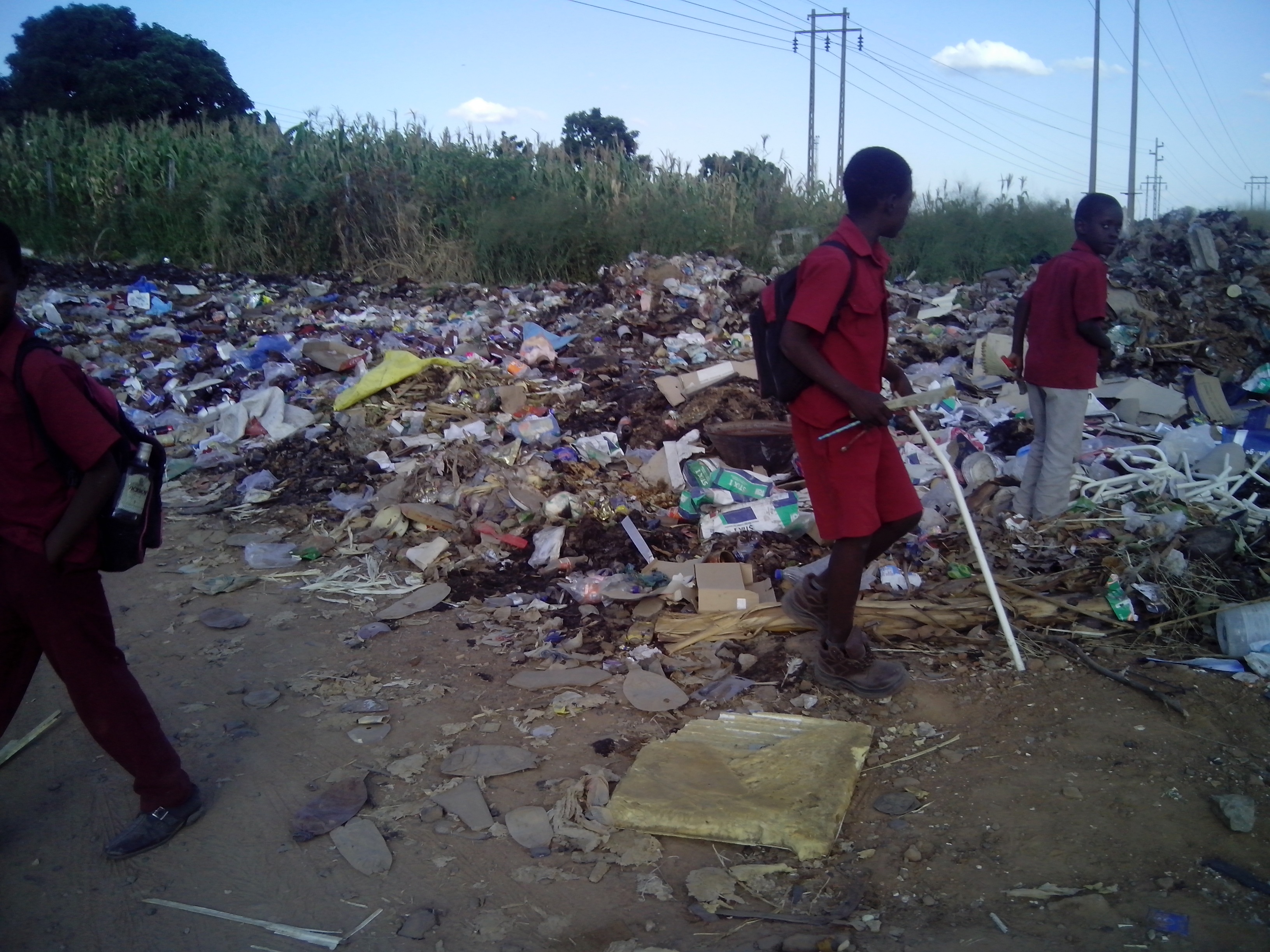 Children playing on dumpsite, Harare, 24 March 2015