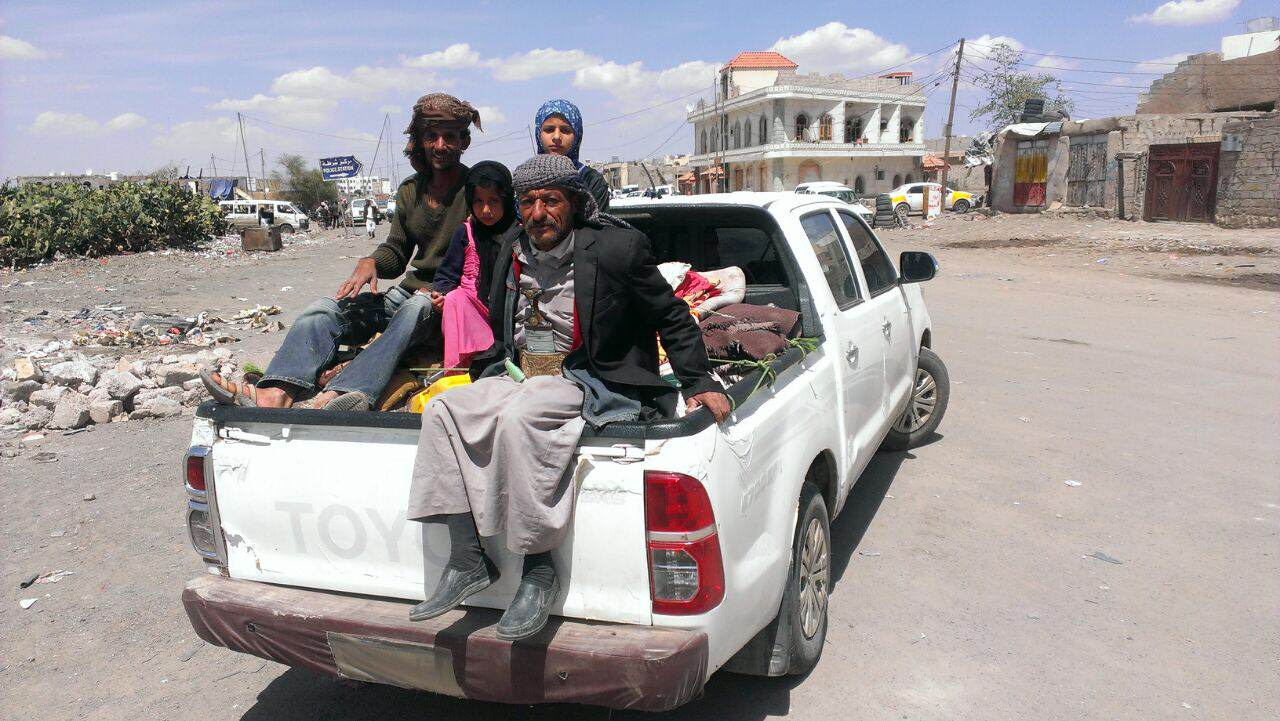 Yemenis flee the capital Sana'a with their families and few possessions