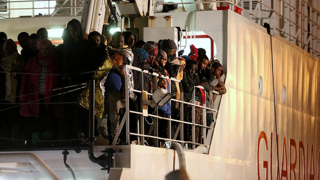 The Gregoretti arrives in the Sicilian capital, Palermo, carrying more than 1,000 refugees and migrants who were rescued from the Mediterranean.