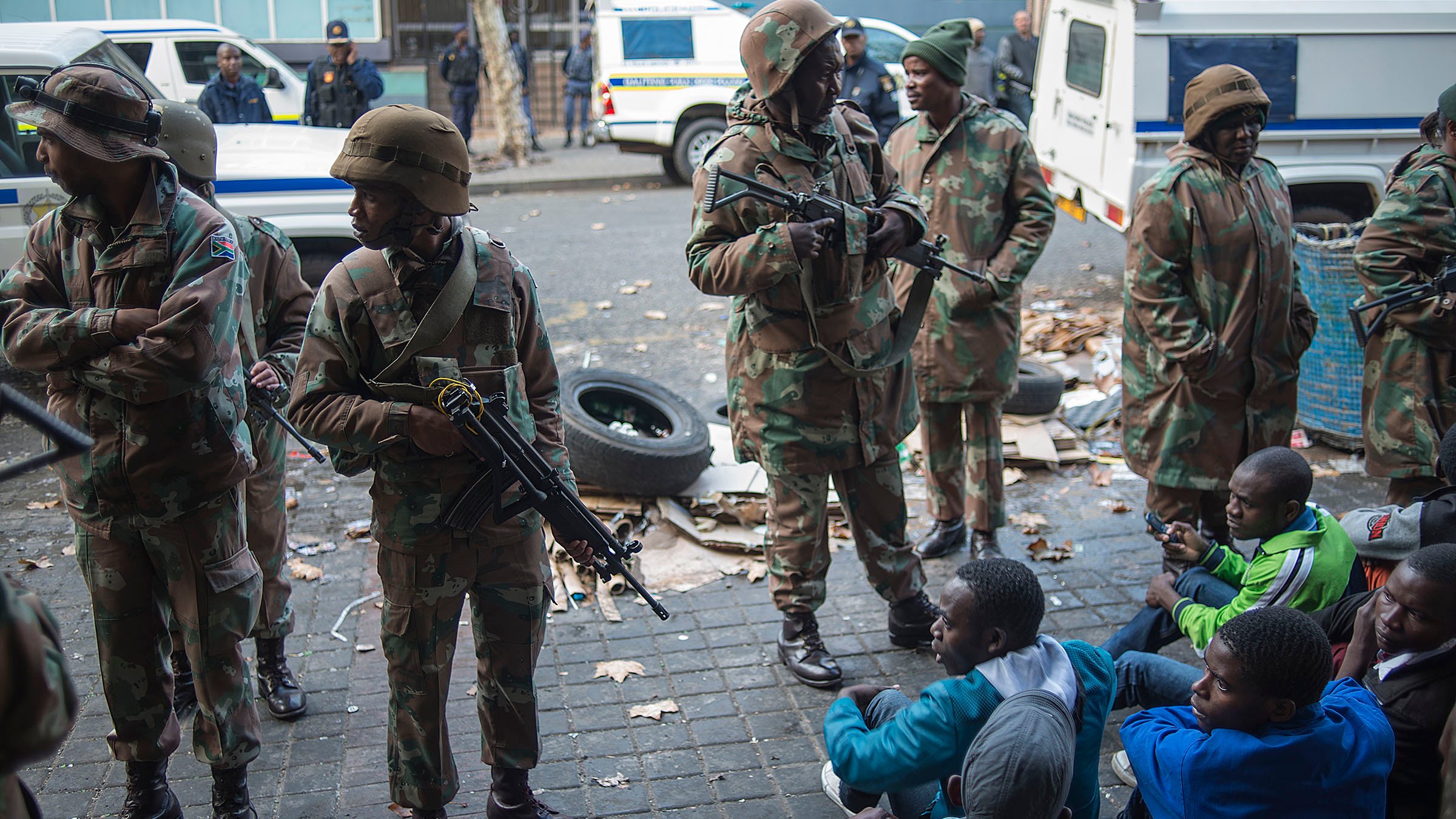 The South African Defence Force joined police to raid buildings in Johannesburg city centre in the early hours of the morning on 8 May 2015, arresting more than 300 foreign nationals.
