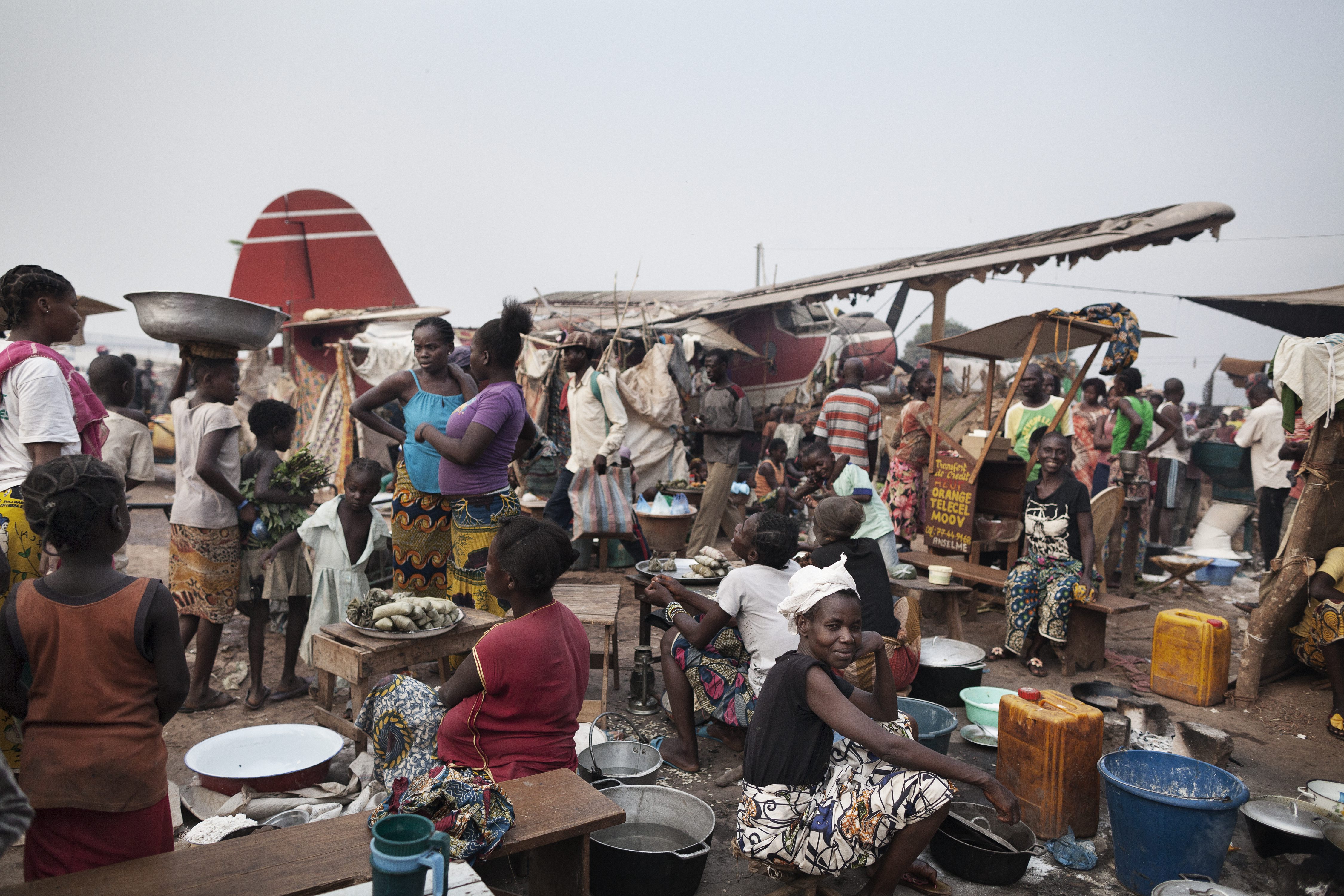 Hundreds of internally displaced people gather at Bangui’s M'poko International Airport in the Central African Republic. 